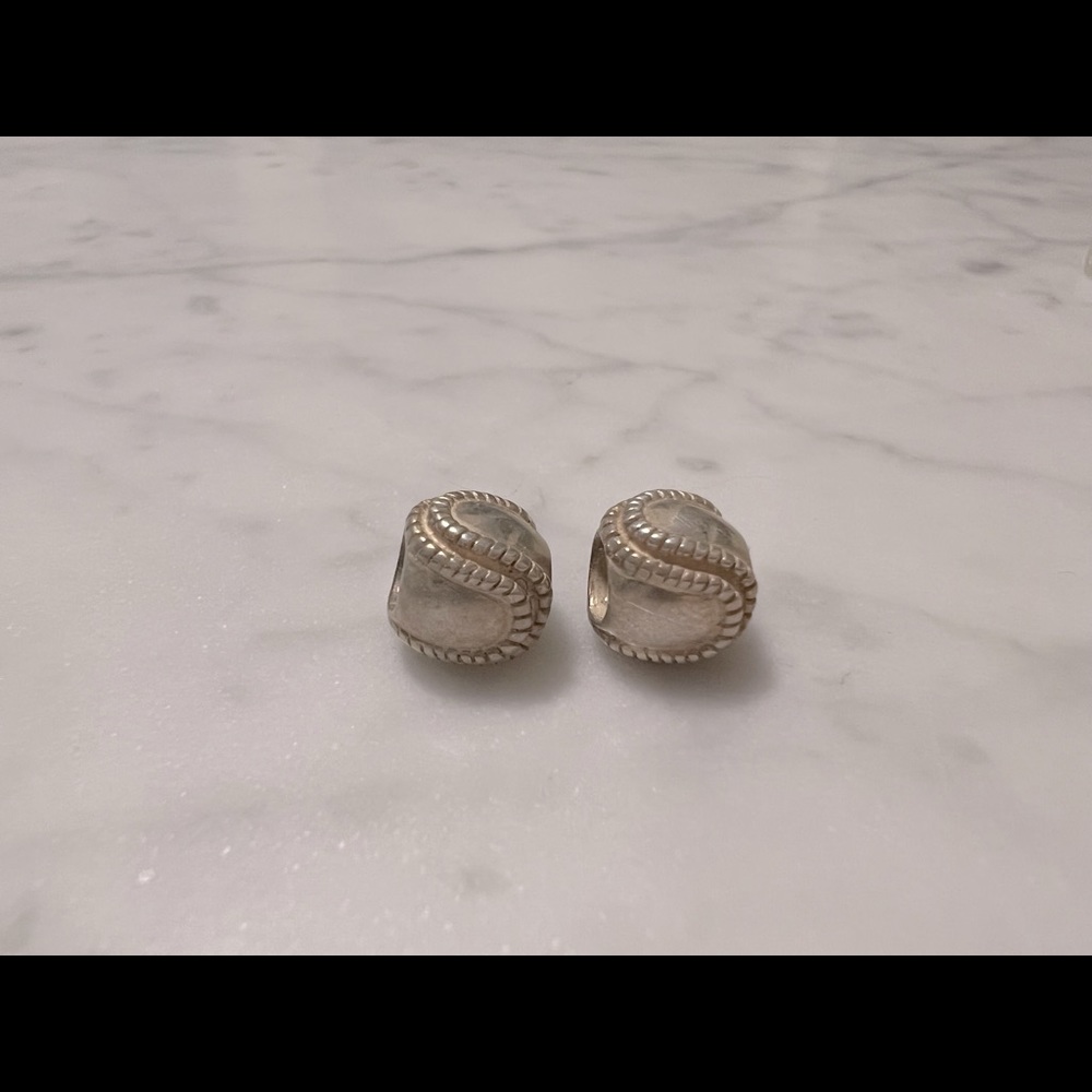 Set of two Chamilia Baseball Bead In 925
Sterling Silver
